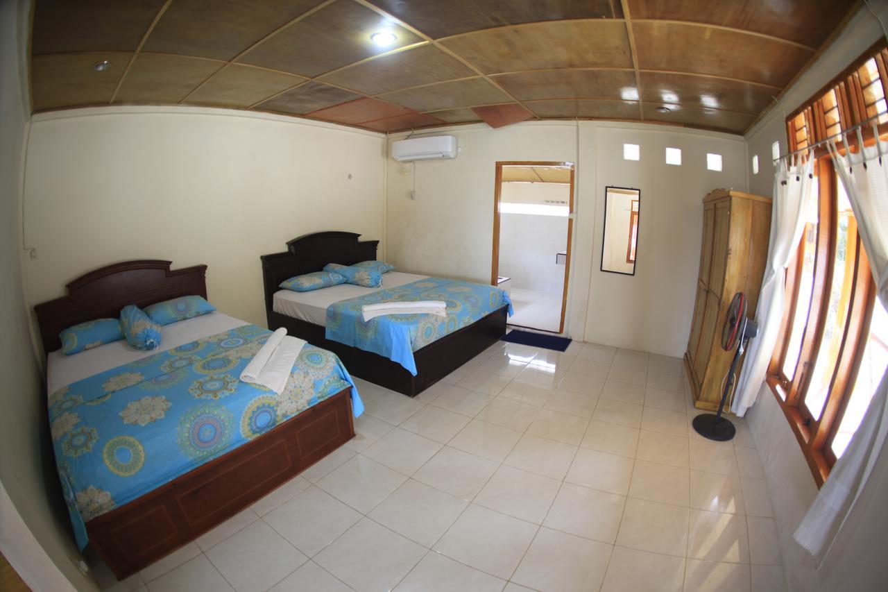 Puri Asu Resort Palau Asu Exterior photo