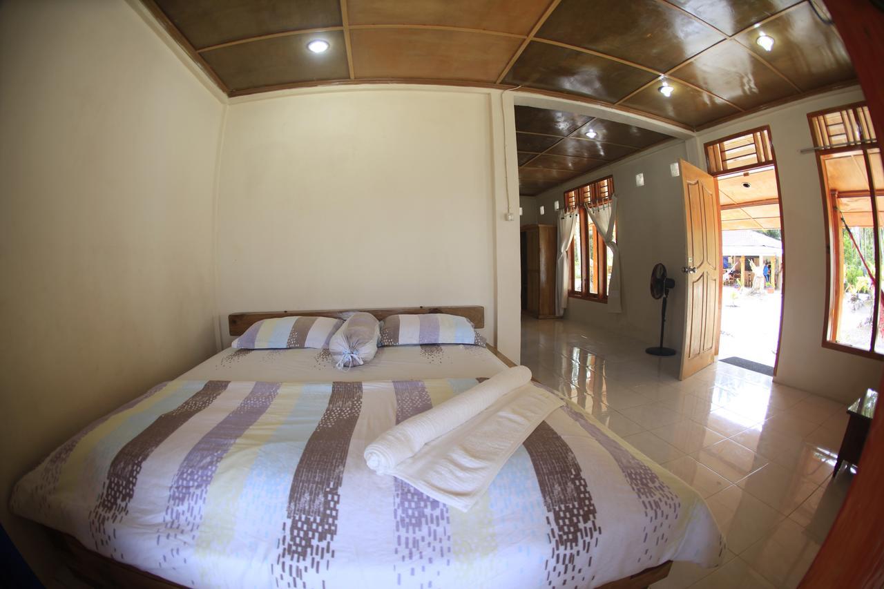 Puri Asu Resort Palau Asu Exterior photo